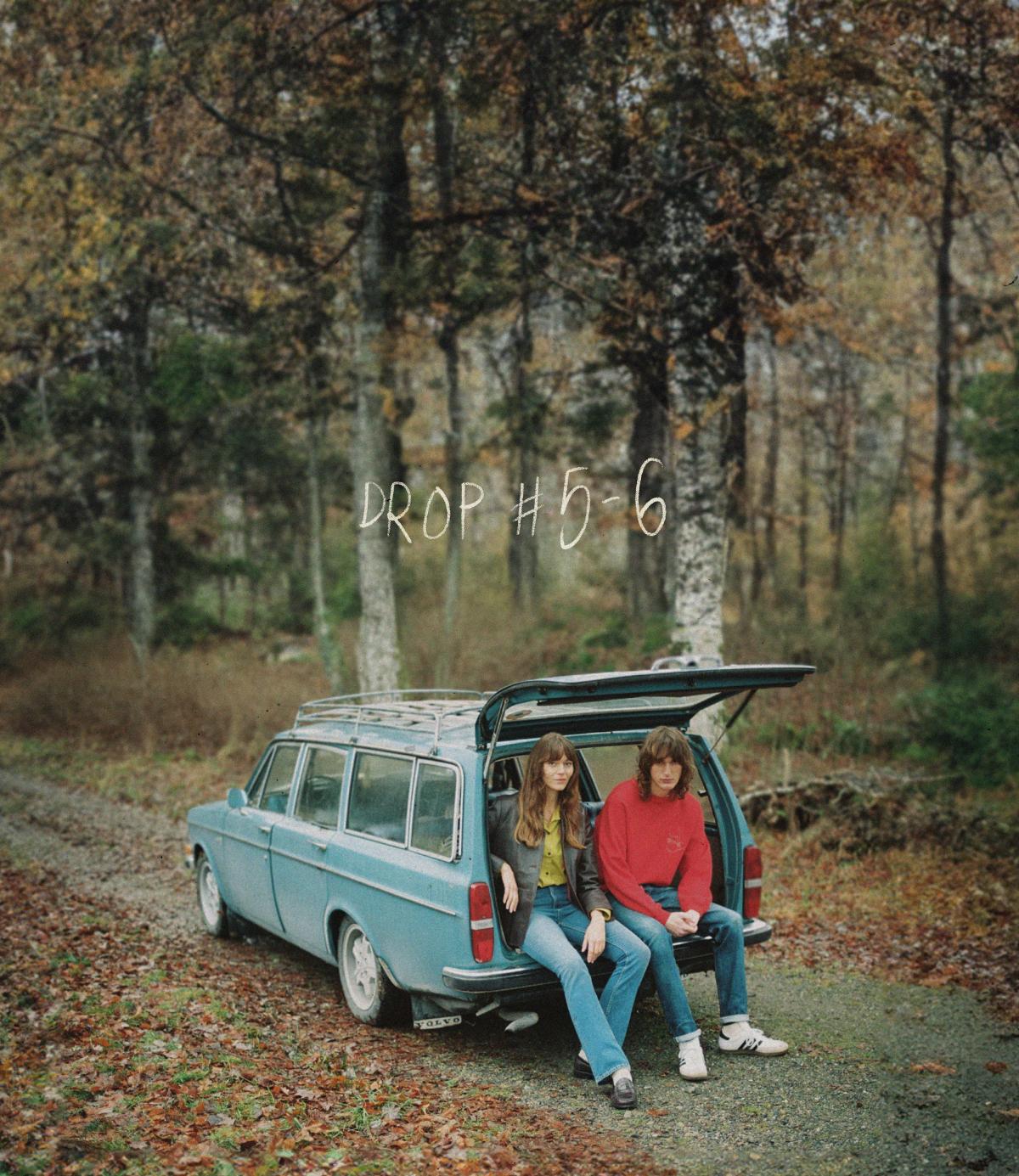 Drop 5-6 banner two models sitting in a car